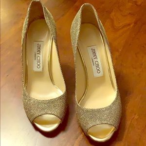 Jimmy Choo beautiful gold shoes.